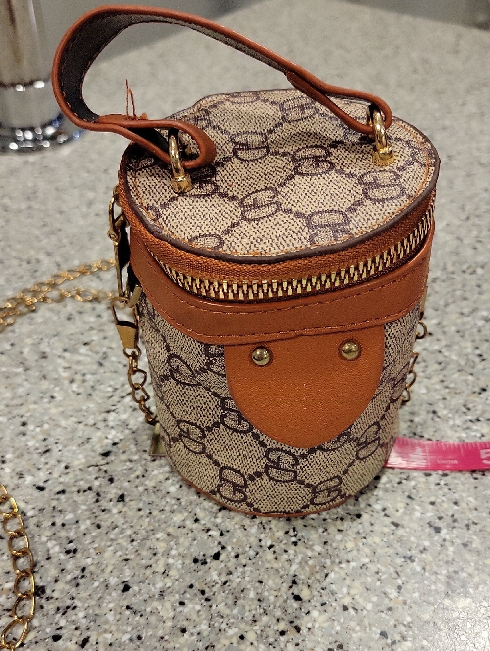 Brown Patterned Cylinder Crossbody Bag with Gold Chain